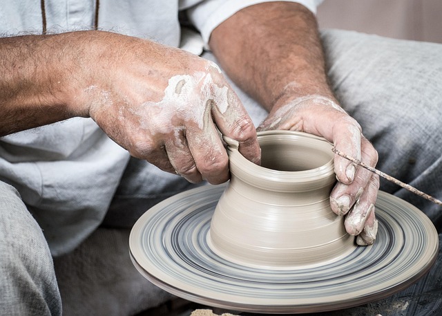 handmade ceramic vase linen cushion