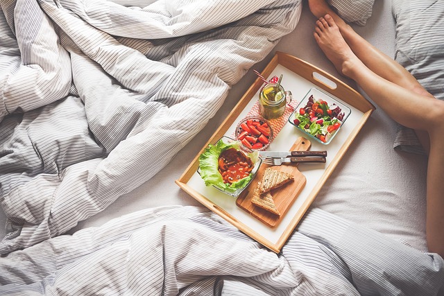wooden tray on couch armrest