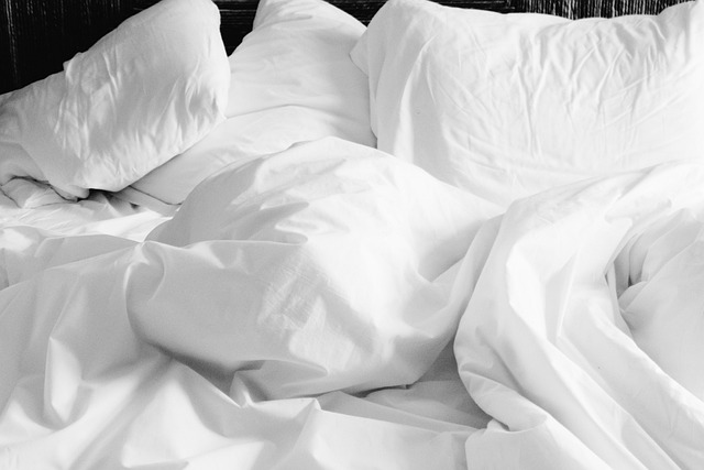 low platform bed white linen bedding